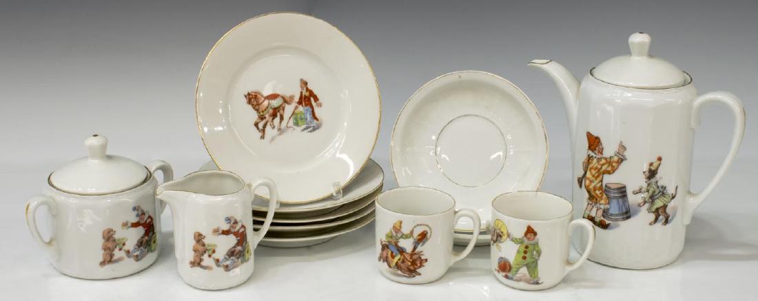 (12) GERMAN PORCELAIN CHILD'S CIRCUS TOY TEA SET: (set of 12) Porcelain children's tea set, Germany, early 20th c., all depicting circus performers and animals, including: (1) tea pot with lid, approx 6.5"h, 3"diam; (1) creamer, hairline above handle