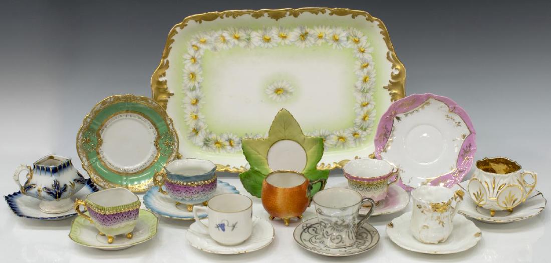 (21) GROUP OF FRENCH LIMOGES PORCELAIN TABLE ITEMS: (lot of 21) Continental porcelain table items, including: (1) Tressemann and Vogt tray, with daisy chain design and gilt edge, marked "T&V France" on back, approx 1.25"h, 13"w, 8.25"d; (8) demitasse c