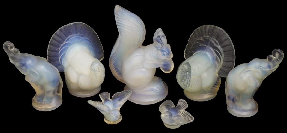 (7) SABINO OPALESCENT ART GLASS ELEPHANTS, TURKEYS: (lot of 7) French Sabino opalescent art glass figures, including (1) squirrel with nut, (2) small elephants, (2) turkeys, (2) miniature birds, incised and molded marks, largest: 3"h, 1lb **Provenance: