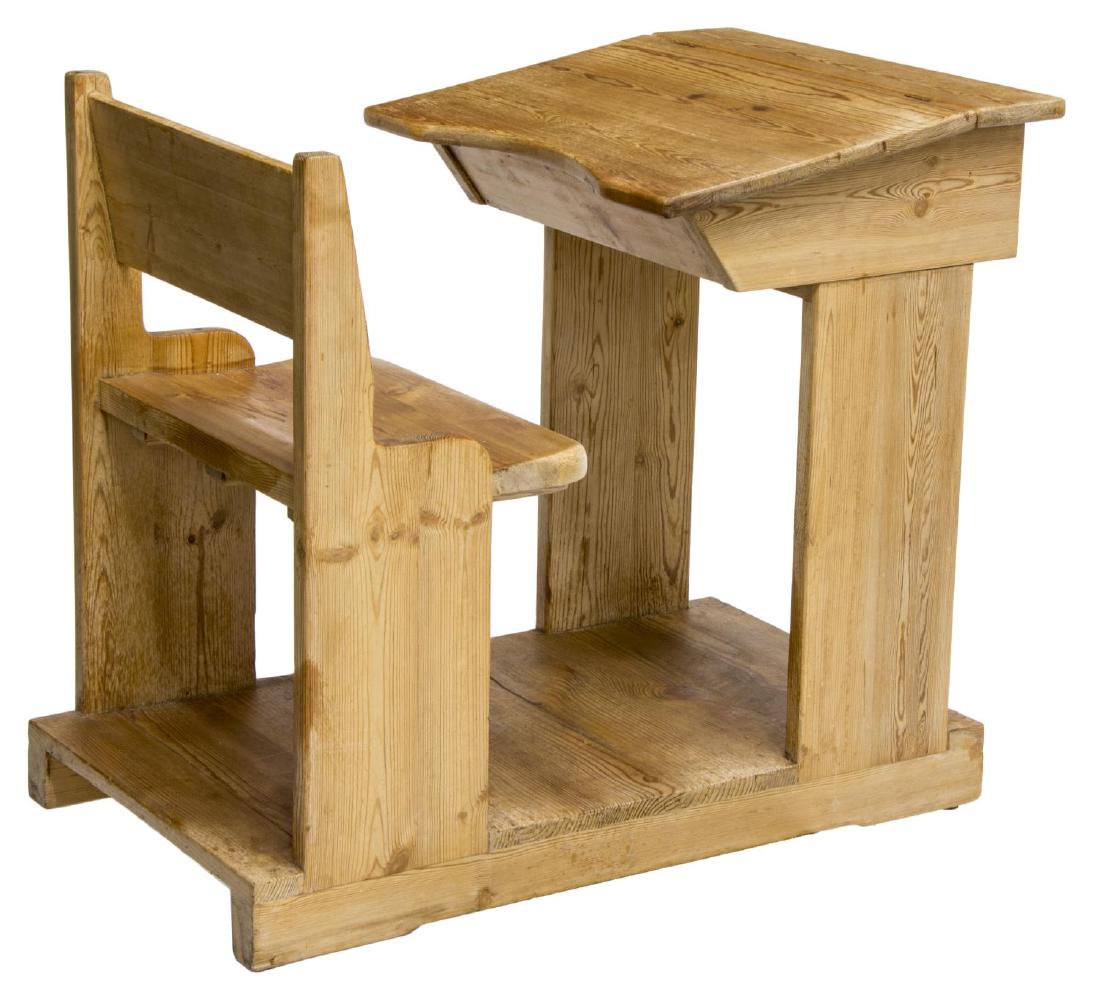 CHILD'S SCHOOL HOUSE PINE DESK AND CHAIR ON BASE: Child's school house desk and chair on base, executed in pine, the chair a simple straight back open over seat, rising on panel supports, the desk a square top, hinged lid opening to storage compartme