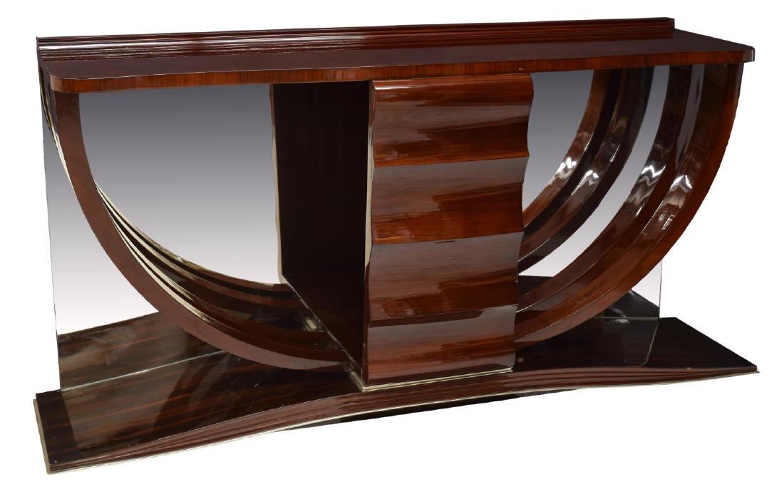 ITALIAN ART DECO STYLE CONSOLE TABLE: Italian Art Deco style rosewood finish console table, late 20th c., a shaped rectangular top with short back rail rising on curving supports at each end, the front with a serpentine support, the open