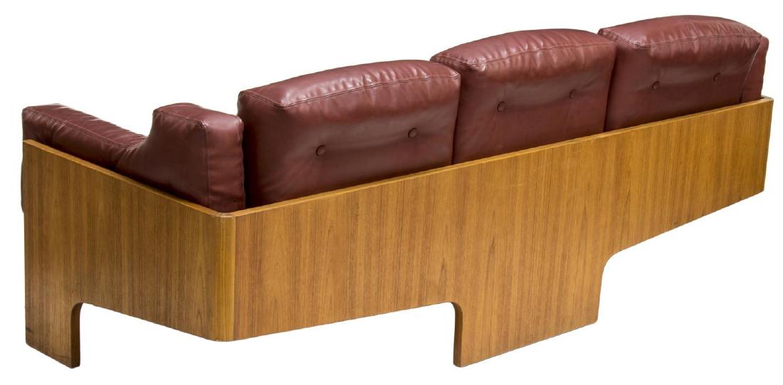SCARCE ORIOLO SOFA BY CLAUDIO SALOCCHI (1934-2012): Italian "Oriolo" (Orilio) sofa, design by Claudio Salocchi (Milan, 1934-2012) for Sormani, a three seat sofa with removable back and seat cushions within the sculptured teakwood frame, curving at the