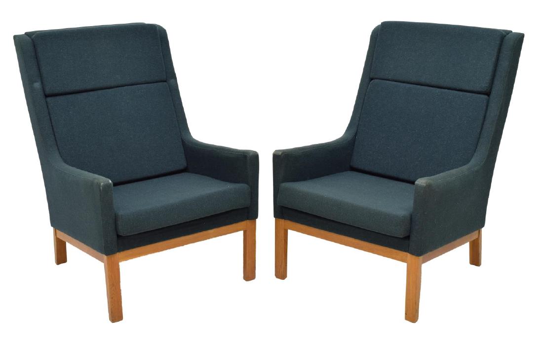 (2) DANISH MID-CENTURY MODERN ARM CHAIRS, LARSEN: (pair) Danish mid-century modern upholstered chairs, c 1960, design by Kai Lyngfeldt Larsen, a dark green fabric with three removable seat and back cushions, rising on squared legs, retaining designer