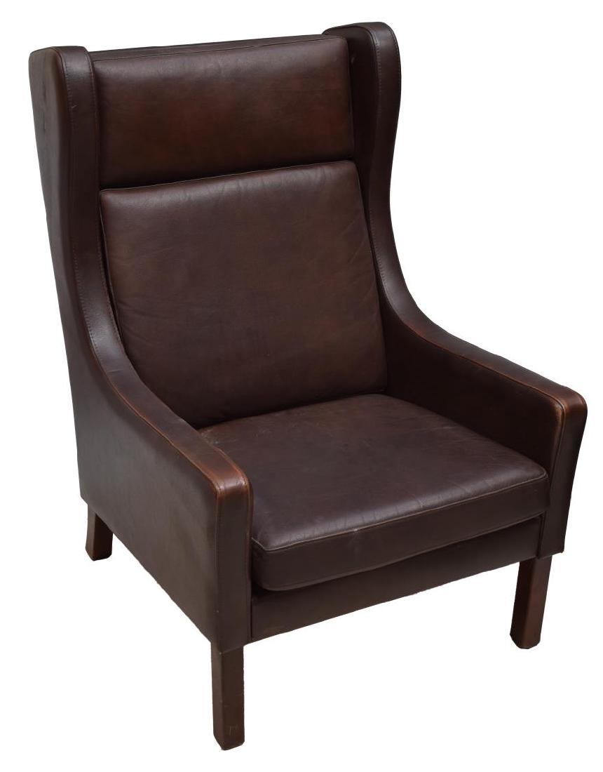 DANISH MIDCENTURY MODERN LEATHER WINGBACK ARMCHAIR: Danish mid-century modern brown leather wingback armchair, c. 1960's, leather upholstery, rising on straight wood legs, some creasing and wear to leather, 40"h, 26.5"w, 33"d Start Price: $80.00
