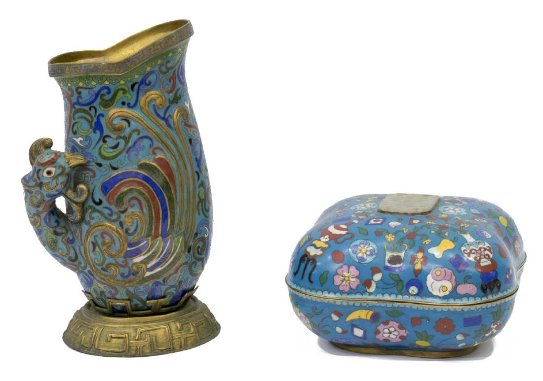 (2) CHINESE CLOISONNE BOX & PHOENIX-FORM PITCHER: (lot of 2) Chinese cloisonne enamel cabinet items, including: (1) archaistic phoenix-form pitcher on stand, approx 9.25"h, 4.75"w, 4"d; (1) covered box, lid with inset soapstone, approx 4"h, 6.75"w, 6