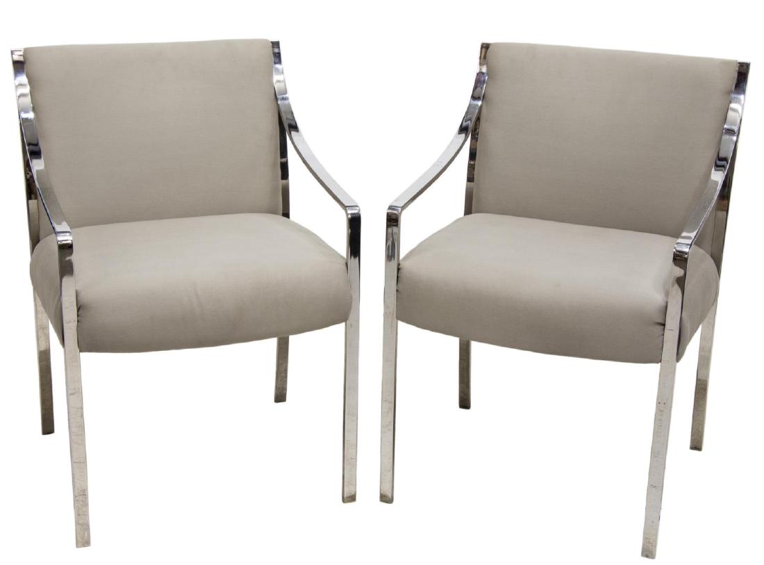(2) STOW & DAVIS MODERN CHROME ARM CHAIRS: (lot of 2) Stow & Davis modern chrome open arm chairs, c. 1970, having a curved back, the seat flanked by chrome squared sloping arms descending to the squared legs, retaining shipping tags, 32.75"h,