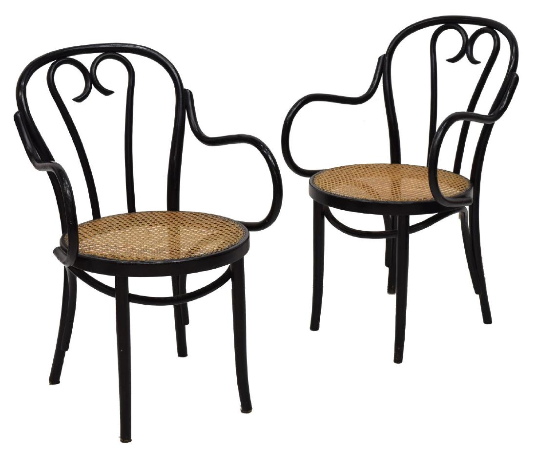(2) THONET STYLE BENTWOOD ARM CHAIRS: (lot of 2) Bentwood arm chairs in black paint bearing paper tags marked ZMG beneath the bentwood seats, 35.5"h, 22"w, 20"d Start Price: $60.00