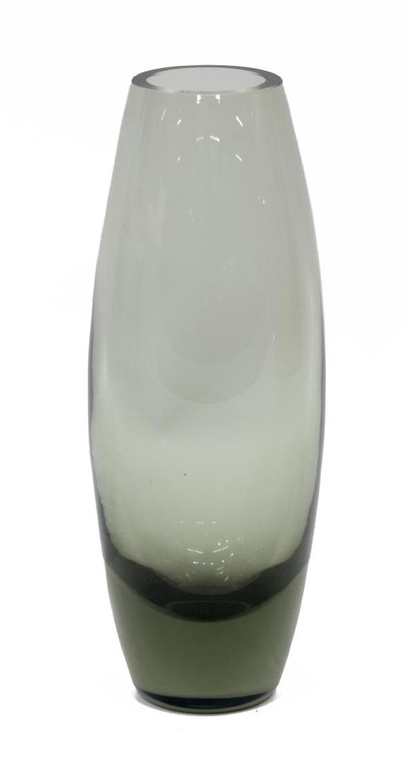 DANISH HOLMEGAARD PER LUTKEN TORPEDO GLASS VASE: Torpedo smoke glass vase, Denmark, c. 1960, designed by Per Lutken for Holmegaard, part of the Akva series, etched mark underfoot, approx 8.75"h, 2" top diameter, 2.25lbs Start Price: $50.00