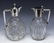 (2) GERMAN 800 SILVER MOUNTED CUT CLARET JUGS