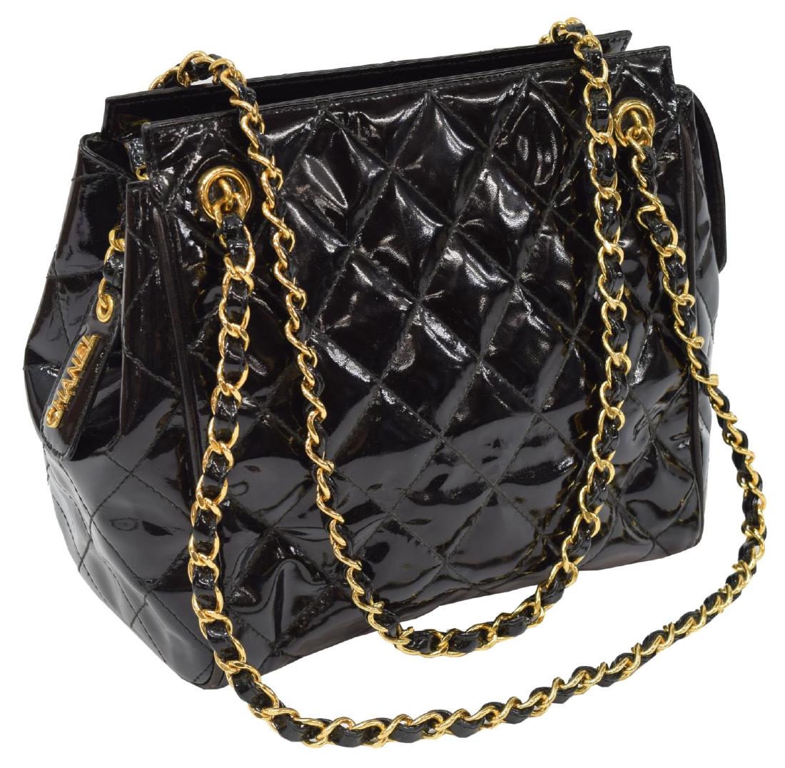 CHANEL QUILTED BLACK PATENT LEATHER SHOULDER BAG: Chanel shoulder bag, in quilted black patent leather, with gold-tone hardware, dual classic chain leather straps, tonal leather lining, dual pockets at interior walls, zip closure at top, stitched CC