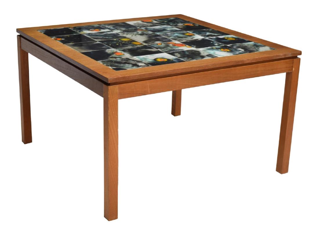 DANISH MID-CENTURY MODERN TEAK & TILE COFFEE TABLE: Danish mid-century modern teakwood and tile coffee table, c. 1960, the square top fitted with glazed and patterned tiles over squared legs, 22"h, 35.5"w, 35.5"d Start Price: $60.00