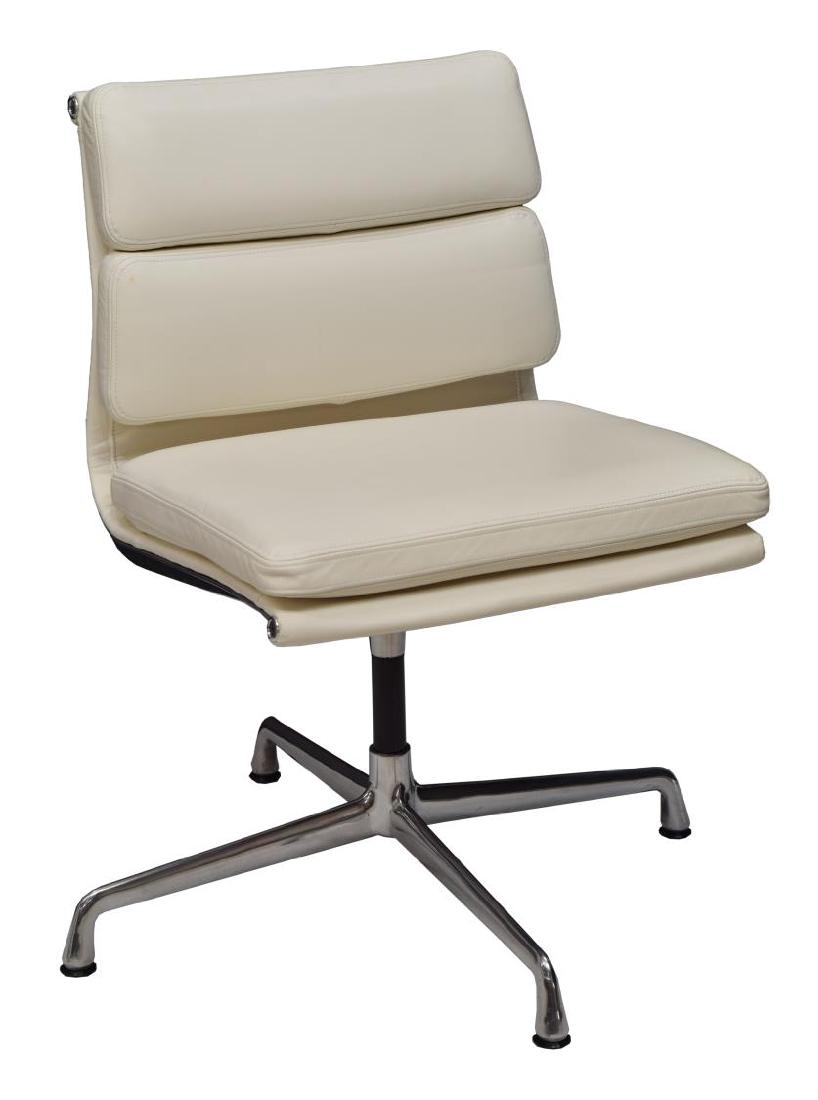 EAMES SOFT PAD WHITE LEATHER SIDE CHAIR: Eames Soft Pad Side chair, design by Charles and Ray Eames, the swivel seat in white leather, rising on the four leg polished aluminum base, Eames tags at the underside, 34"h, 21"w, 20.5"d *Provenance