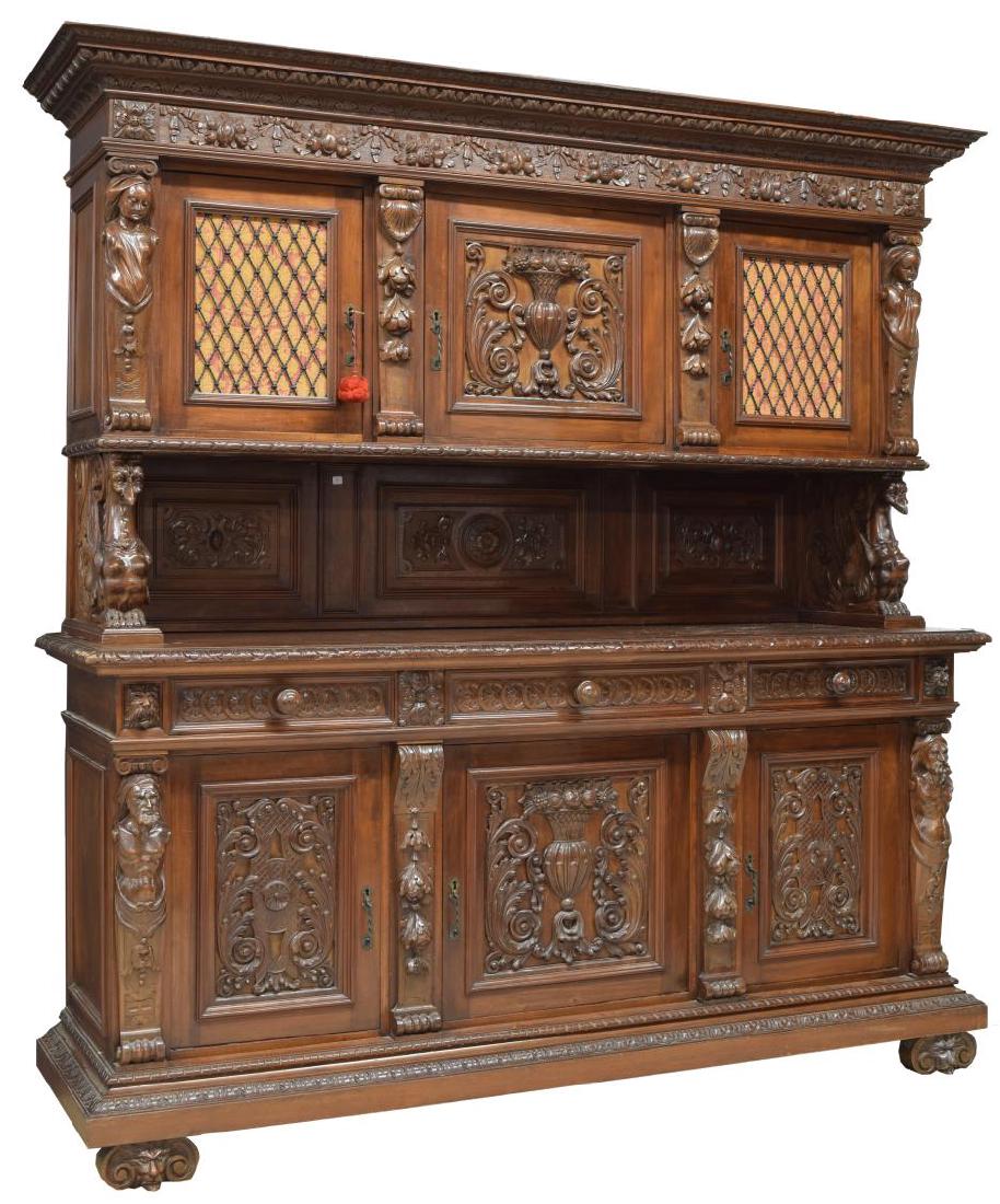 ITALY RENAISSANCE REVIVAL HIGHLY CARVED SIDEBOARD: Italian Renaissance Revival sideboard, early 20th c., having stepped corniced top, over carved fruit and scrolling foliate frieze, three cabinets, two with wrought iron inset, scrolled brackets with w