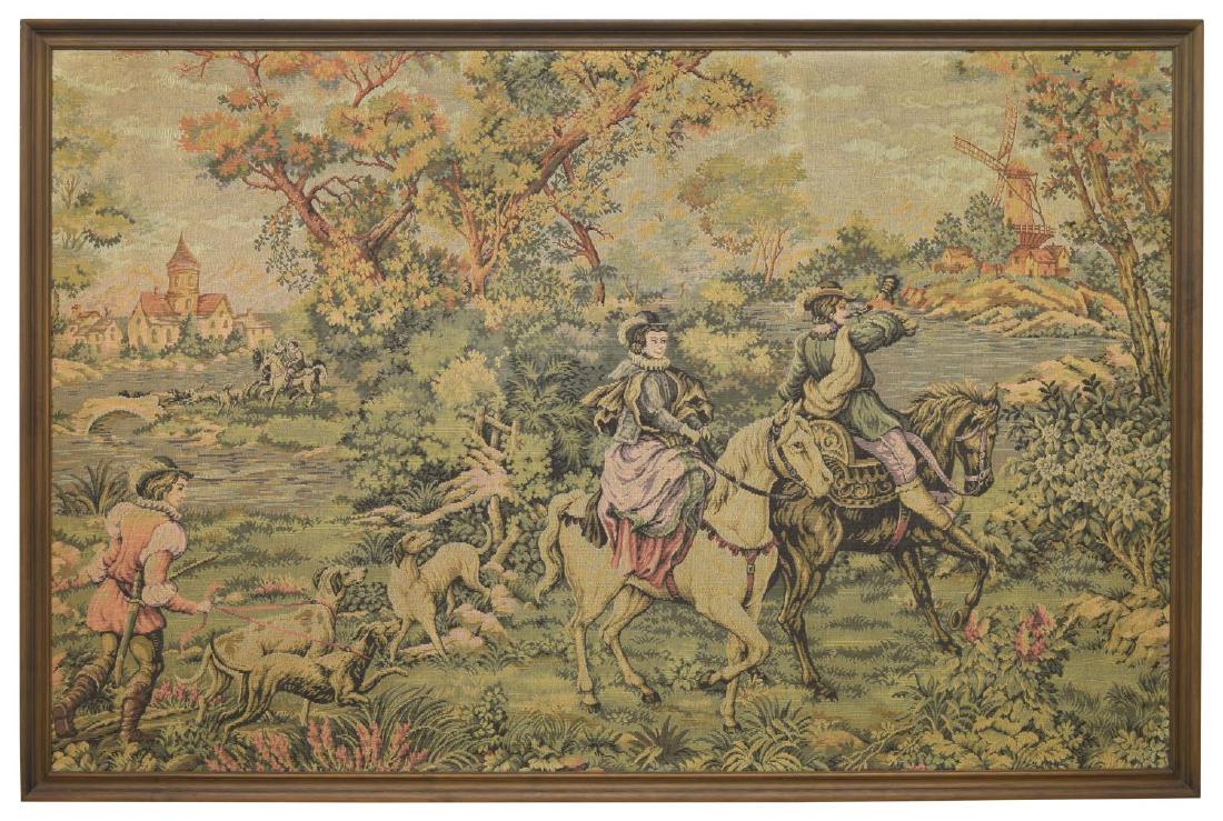 LARGE FRAMED WALL TAPESTRY FOX HUNT: Framed wall tapestry, 20th c., scene of fox hunt, man with hounds in foreground, man and woman on horses, windmill in background, in wooden frame, hanging rings at top, appox 54"h, 81.5"w, 1.25"d, 17l