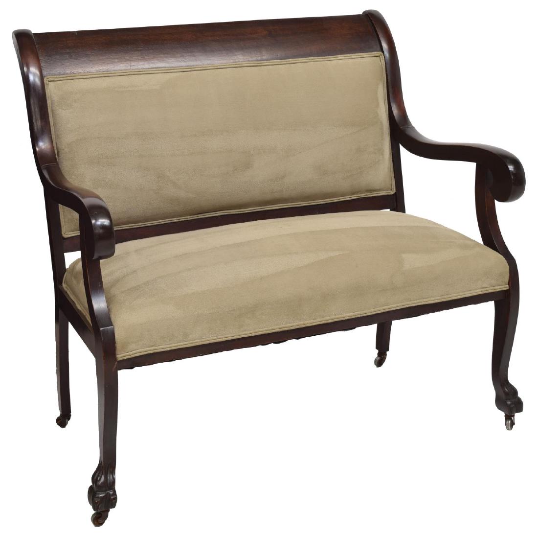 AMERICAN MAHOGANY EMPIRE SETTEE: American Empire mahogany framed settee, 19th c., a curved back crest rail over later gray upholstery framed by scrolling arms, rising on paw foot legs with castors, 40.5"h, 46.5"w, 27"d Start Price: $