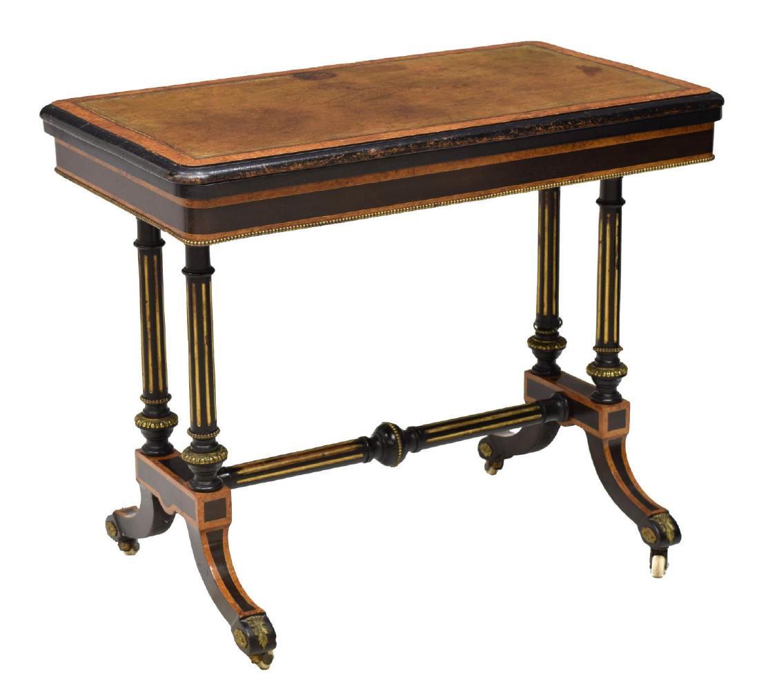 LOUIS XVI STYLE GAME TABLE: Louis XVI style game table, 19th c., having brass accents, ebonized and contrasting wood, the rectangular inset leather folding top opens to a felt game surface, rising on ribbed supports with a trest