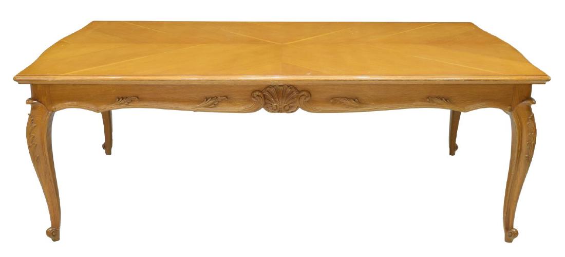 FRENCH LOUIS XV STYLE DRAW LEAF DINING TABLE: Louis XV style draw leaf dining table, France, 20th c., having chevron matched tabletop, over shaped apron with shell carving, rising on cabriole legs, ending in scroll feet, closed: approx 31"h, 83.5