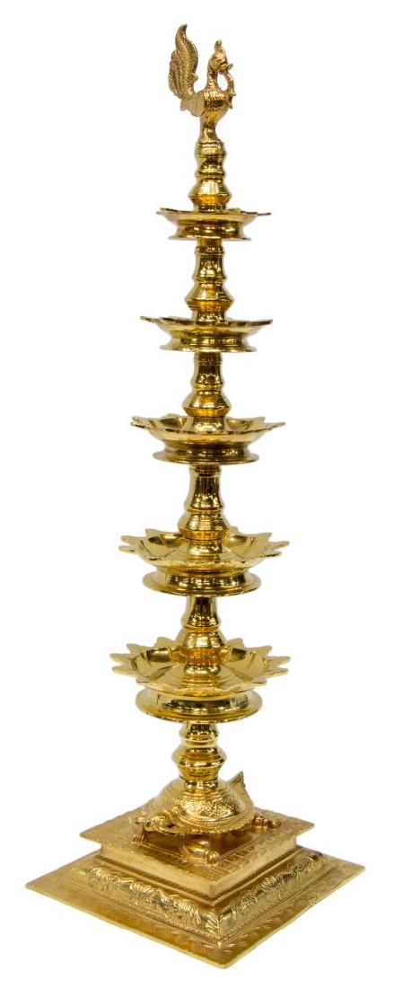 ORNAMENTAL 24KT GOLD PLATED ANNAM LAMP: Large 24kt gold plated brass Annam lamp, the mythological bird over graduated tiers, rising on the back of a turtle, squared base detailed with elephants and ornamental designs, 32.5"h, 16.5lbs Start 
