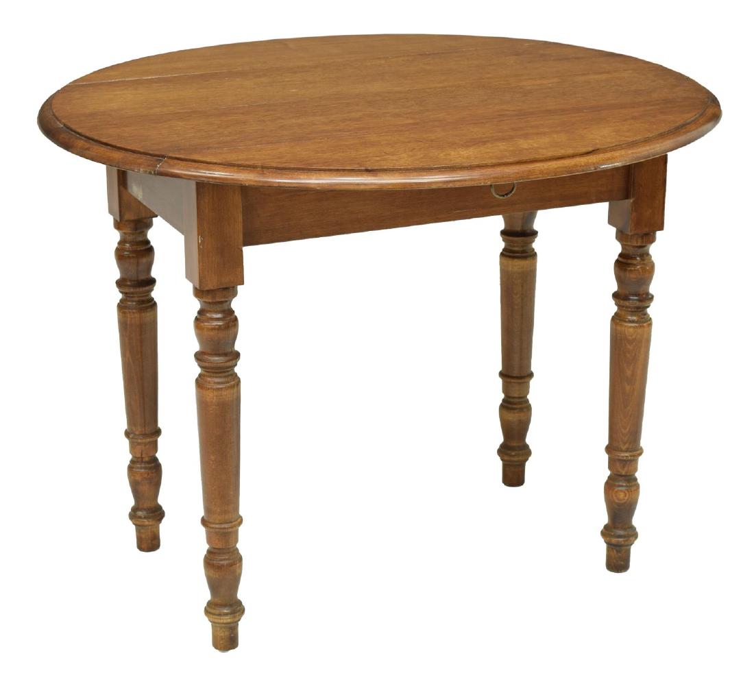 VINTAGE FRENCH OAK DROP LEAF TABLE: Vintage oak drop leaf table, France, 20th c., having oval tabletop, rising on turned legs, open: approx 29.5"h, 35"w, 39.25"d, closed: approx 29.5"h, 20.25"w, 39.25"d Start Price: $100.00