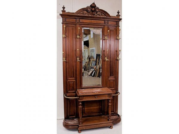 LARGE ANTIQUE FRENCH MIRRORED HALL TREE: A high quality, ca. 1890, French mirrored hall tree. Marble topped drawer at center, curved brass umbrella racks with drip pans, eight large brass coat hooks. A large beveled mirror (48"x17") at cente
