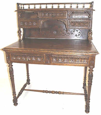 HIGHLY CARVED ANTIQUE FRENCH BRETON DESK