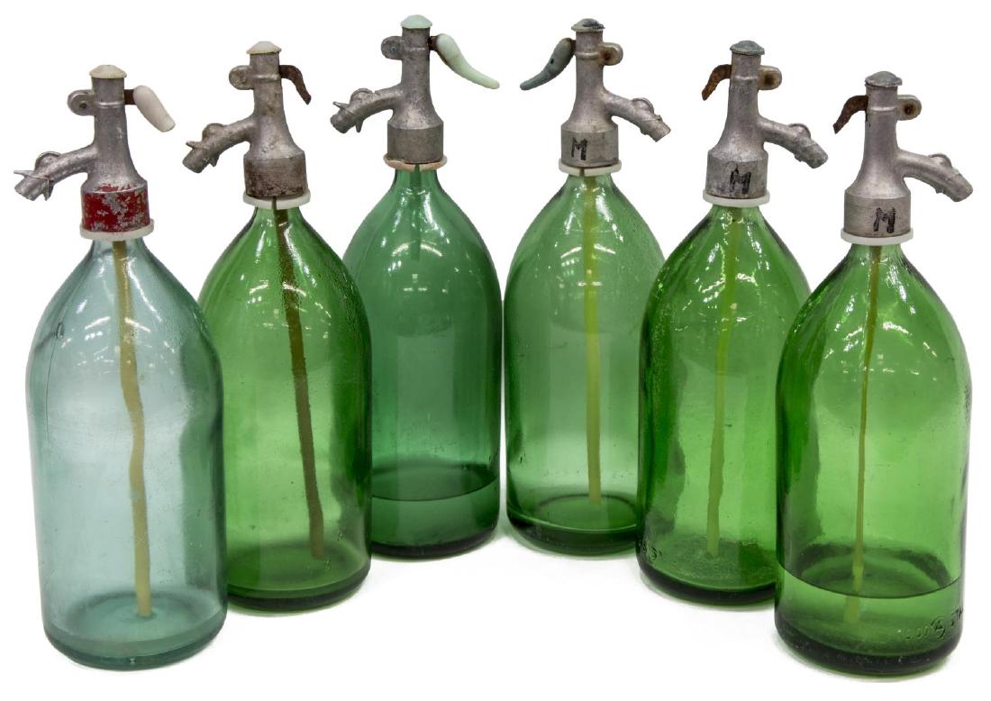 (6) VINTAGE SODA SIPHON SELTZER GREEN GLASS BOTTLE: (lot of 6) Vintage soda siphon seltzer bottles, 20th c., with green glass bottle, wear with age, approx 13.5"h, 4"diam, 19lbs total Start Price: $60.00