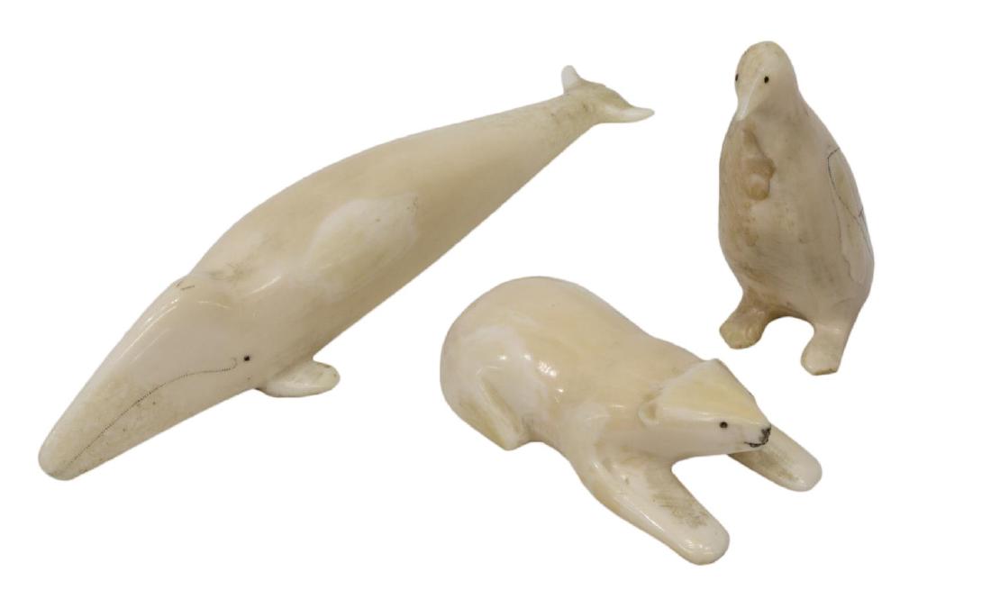(3) INUIT WALRUS CARVED WHALE, POLAR BEAR, PENGUIN: (lot of 3) Inuit walrus carving of a whale, polar bear and penguin, unsigned, largest: 5.1/8"l, 1.3/8"w, 1"d Start Price: $60.00