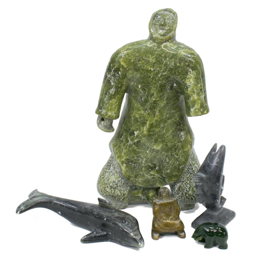 (4) LARGE INUIT FIGURE & OTHER INUIT CARVINGS: (lot of 5) Inuit stone carvings: (1) large green stone figure, lacking hand, 12"h, 7"w, 4"d; (1) fish, lacking tip of tail, 5"h; (1) dolphin, many scratches, 8"l; (1) small standing figure, 2.75"h; (1