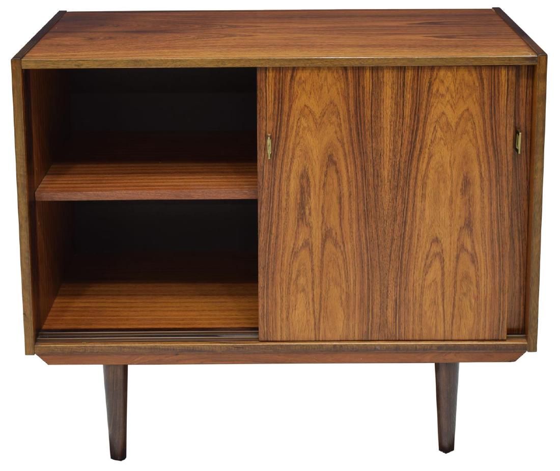 DANISH MID-CENTURY MODERN ROSEWOOD CABINET: Danish mid-century modern rosewood cabinet, c. 1960, case fitted with dual sliding doors, opening to shelf, rising on tapered legs, approx 30.75"h, 35.5"w, 17.5"d Start Price: $100.00