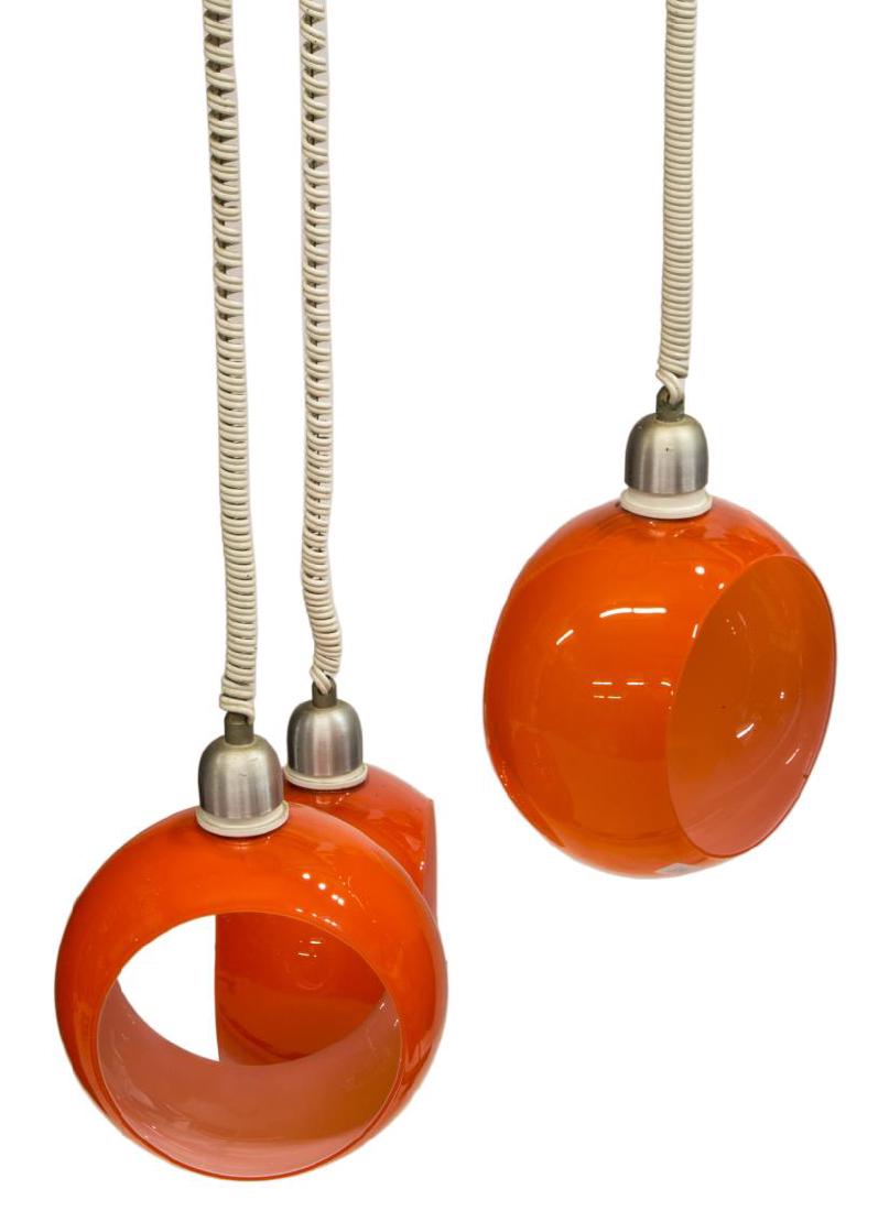 ITALIAN MODERN 3LT ORANGE GLASS CHANDELIER: Italian modern 3 light chandelier, having round orange metal ceiling cap, with spiral plastic cords of varying lengths, ending in orange and white round glass shades, having open sides, in need of wir