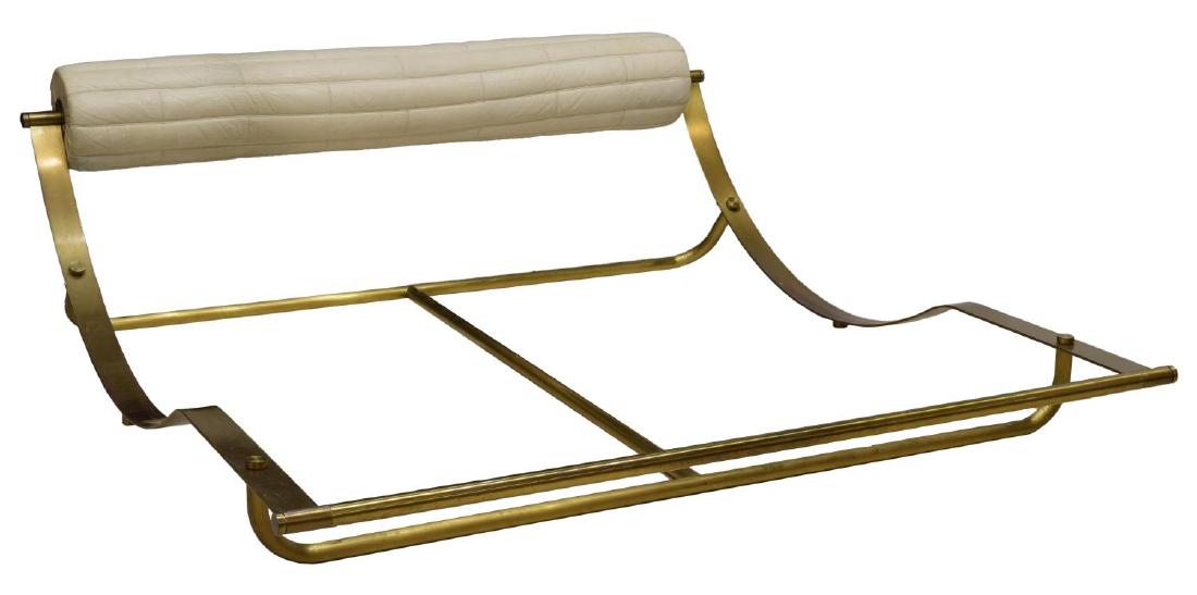 ITALIAN MODERN BRASS BED FRAME: Italian modern bed, c. 1970, brass frame, with quilted leather bolster headboard, some patination to metal, tears and marks to leather, exterior: approx 27"h, 78.75"w, 87.5"d Start Price: $250.00