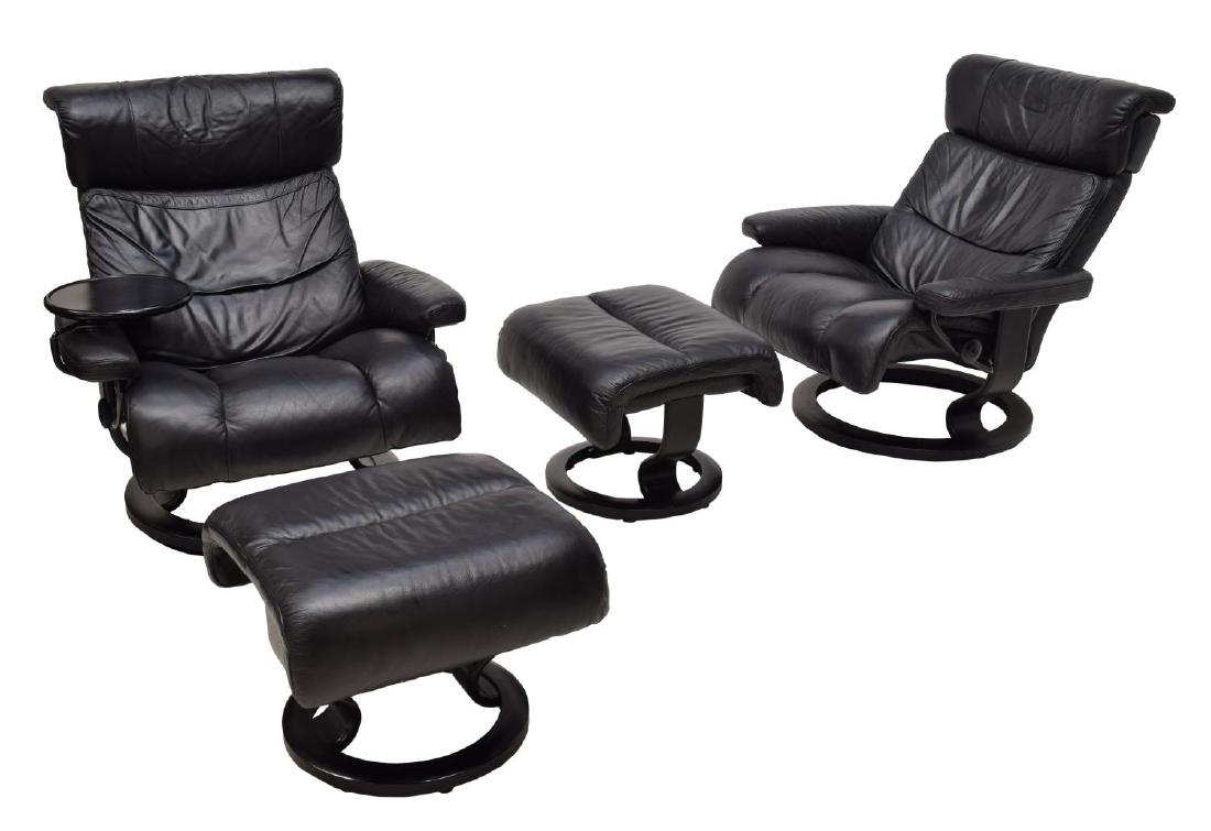 (4) EKORNES STRESSLESS LEATHER CHAIRS & OTTOMANS: (lot of 4) Stressless chairs and footstools by Ekornes of Norway, reclining swivel base chairs upholstered in black leather with matching footstools, one with mounted removable circular table, chairs: