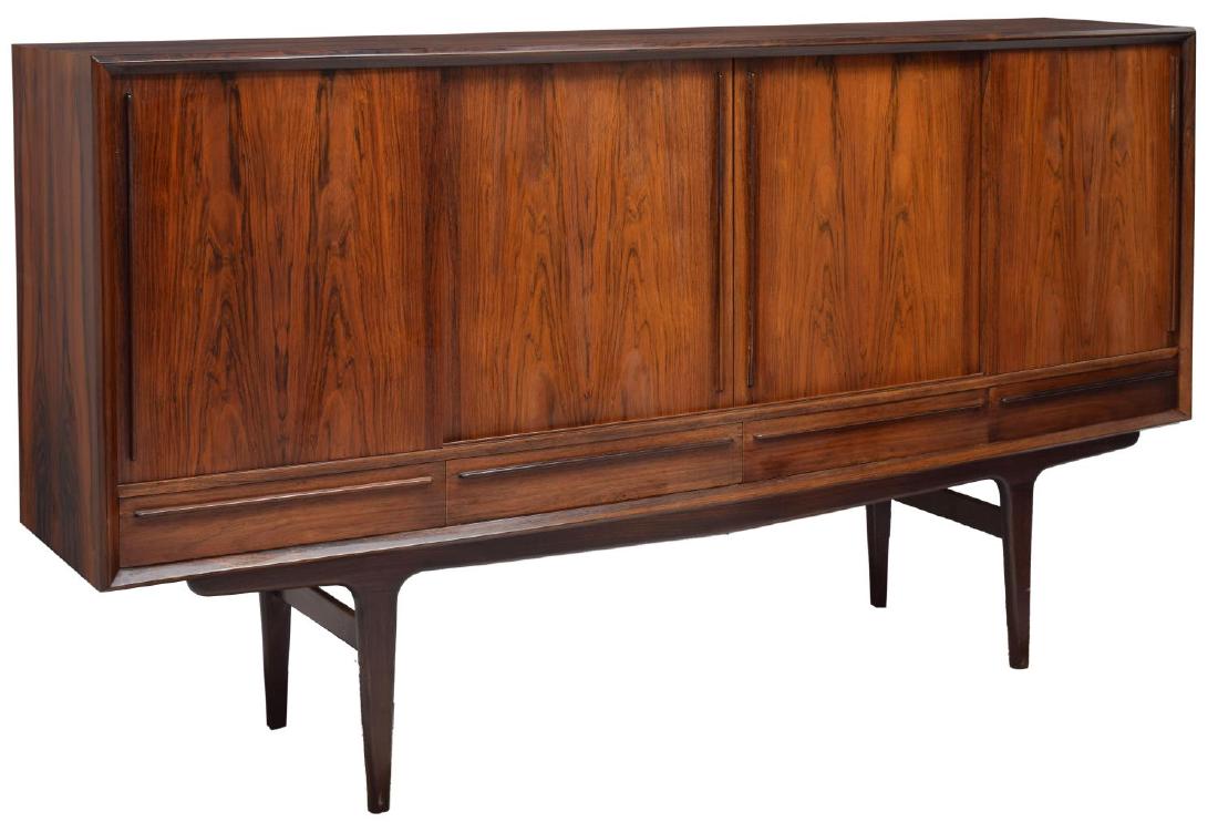 DANISH MID-CENTURY MODERN ROSEWOOD SIDEBOARD: Danish mid-century modern rosewood sideboard, 1960's, having four sliding doors opening to shelves and three interior drawers, four lower exterior drawers, rising on squared tapered legs, 45"h, 79"w, 