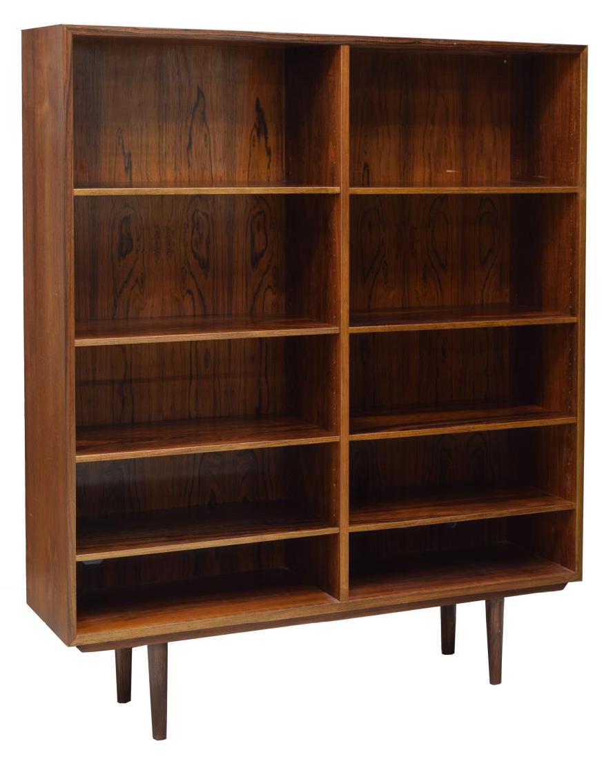 DANISH MID-CENTURY MODERN ROSEWOOD BOOKCASE: Danish mid-century modern rosewood divided bookcase by Omann Jun MÃ¸belfabrik, 1960's, adjustable height shelves, rising on tapered turned legs, 55.75"h, 47.25"w, 11.5"d Start Price: $150.00