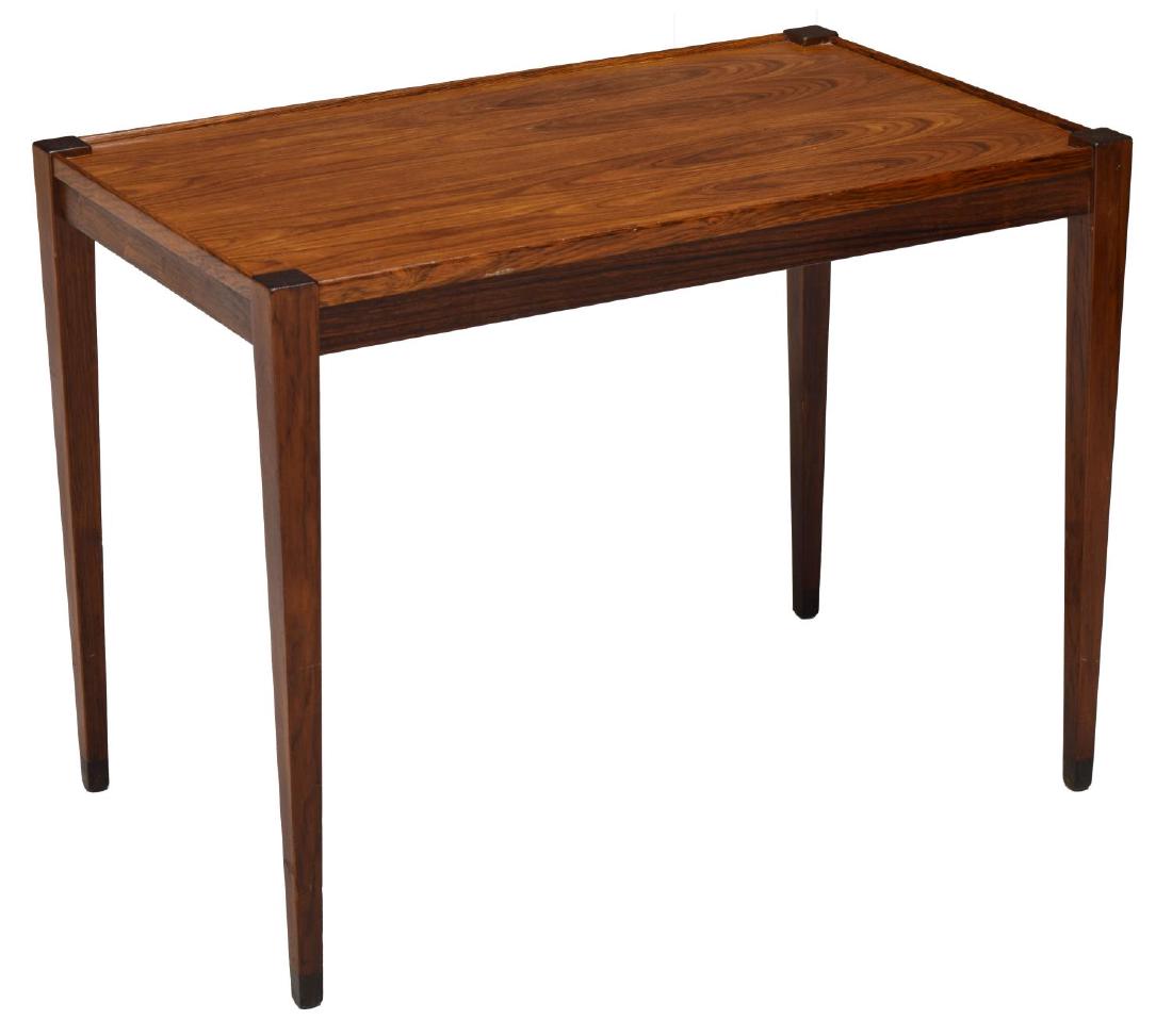 DANISH MID-CENTURY MODERN ROSEWOOD SIDE END TABLE: Danish mid-century modern rosewood side table, c. 1960, rectangular top, over tapered block legs, stamped 'design nr.' and made in Denmark under tabletop, approx 22.5"h, 29.5"w, 18"d Start Price: $60.