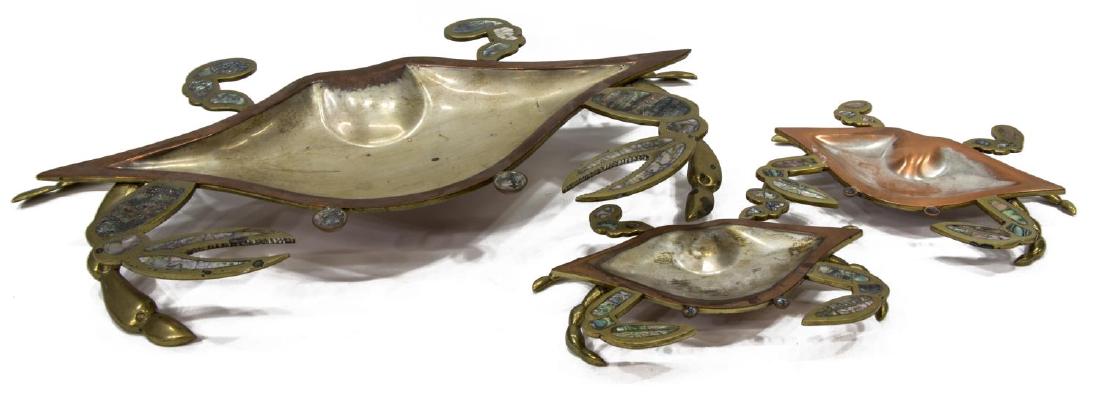 (3) MEXICAN FCS COBRE METAL & ABALONE CRAB DISHES: (lot of 3) Crab dishes, Mexico, mid 20th c., stamped 'Tlaquepaque FCS Cobre Mexico,' brass and copper inlaid with abalone, including: (1) large crab, 2.75"h, 23"w, 12"d, (2) small crabs, 1.5"h, 9.5"w,