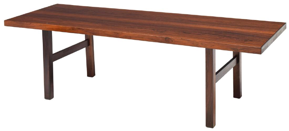 VIBY J DANISH MID-CENTURY MODERN ROSEWOOD TABLE: Danish mid-century modern rosewood coffee table, c. 1960, produced by Viby J, with rectangular top, over block legs joined by a stretcher, label to underside, approx 20.5"h, 67"w, 23.5"d Start Price: 