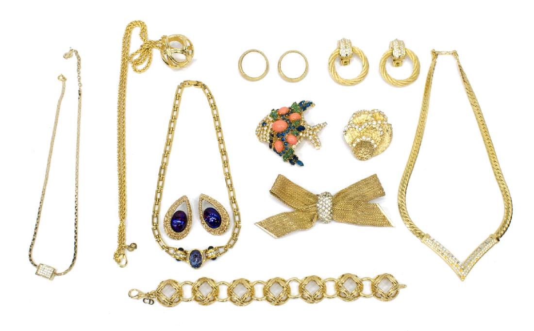 1960'S/1970'S CHRISTIAN DIOR, GIVENCHY JEWERLY LOT: (lot) Costume jewelry group, most signed, including: (8pcs) Christian Dior, (one) multi-color rhinestone and faux coral cabochon fish brooch, dated 1970, (pair) gold tone clip earrings with rhinestone