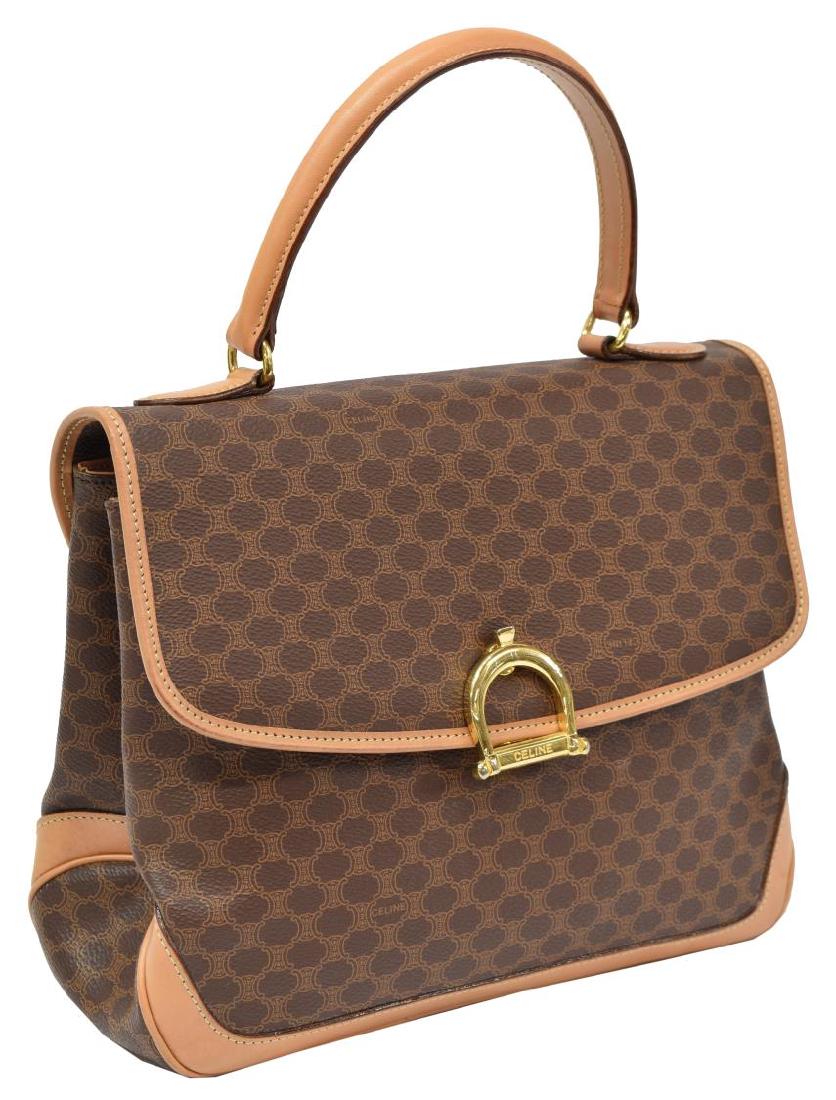 CELINE BROWN MACADAM CANVAS & LEATHER FLAP BAG: Celine flap bag, in brown Macadam coated canvas, with gold-tone hardware, tan leather trim, single rolled top handle, two interior compartments, single zipper pocket at interior wall, snap closure at 
