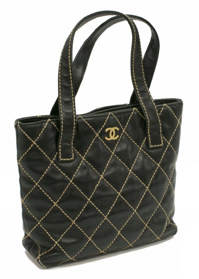 CHANEL BLACK QUILTED LEATHER WILD STITCH TOTE BAG: Chanel small tote bag, in black calfskin leather, with gold-tone hardware, contrasting wild stitch quilting, dual flat top handles, over magnetic clasp closure, tonal jacquard-lined interior, two pock