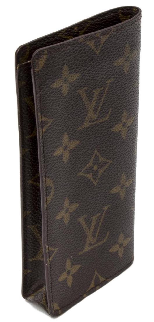 LOUIS VUITTON MONOGRAM PHONE CASE: Louis Vuitton phone case, in brown and tan monogram coated canvas, brown Alcantara lining, open top, slight wear, measurements for shipping purposes only - 6 3/8"h, 3"w, 0.75"d, 0.5lb *Provenance: Lux