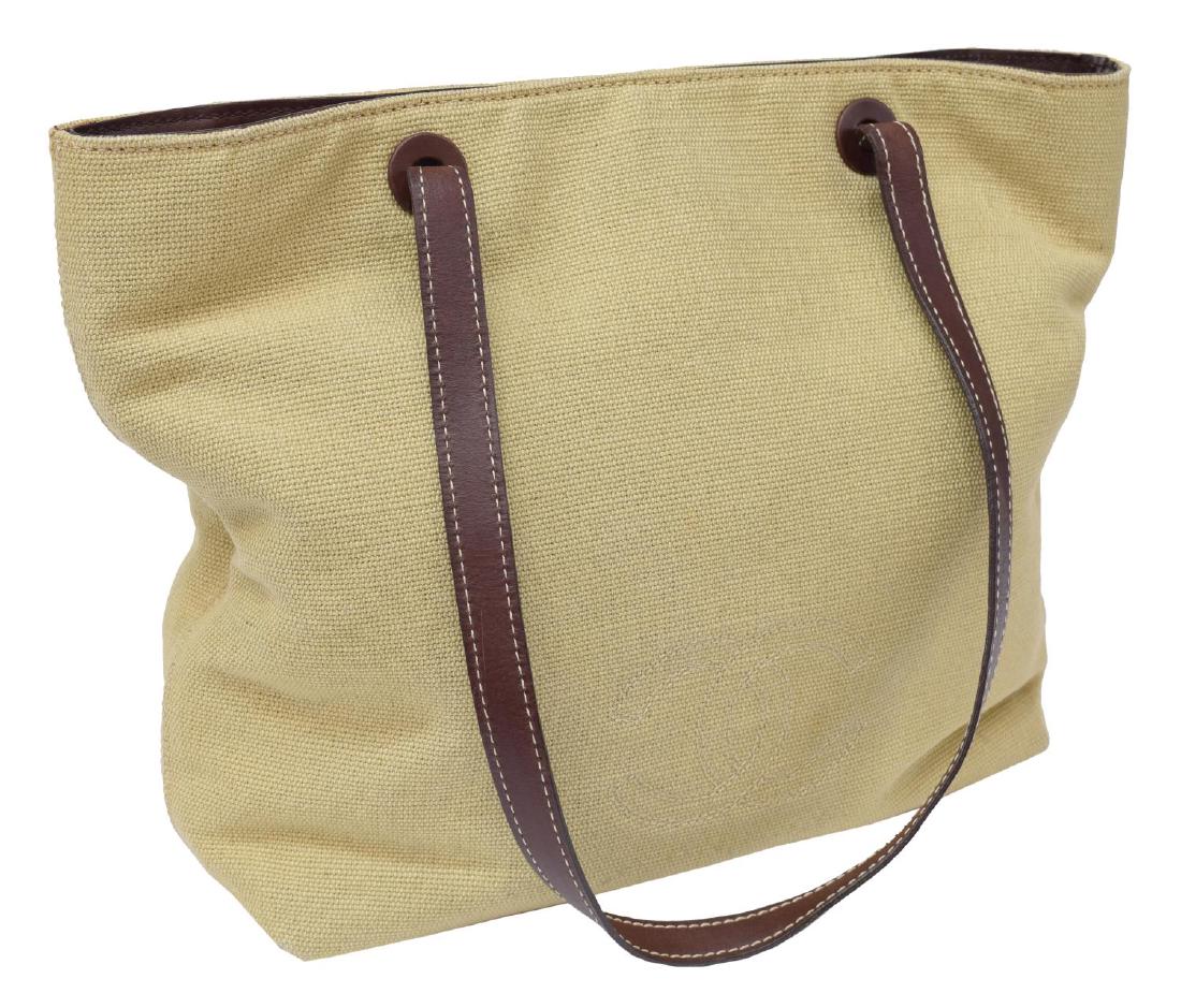 LARGE CHANEL BEIGE WOVEN CANVAS SHOULDER TOTE: Large Chanel beige woven canvas shoulder tote with brown leather handle straps, stitched CC logo to one side, dual snap closure, dark brown lined interior with zipper and slot pockets, some spotting, 