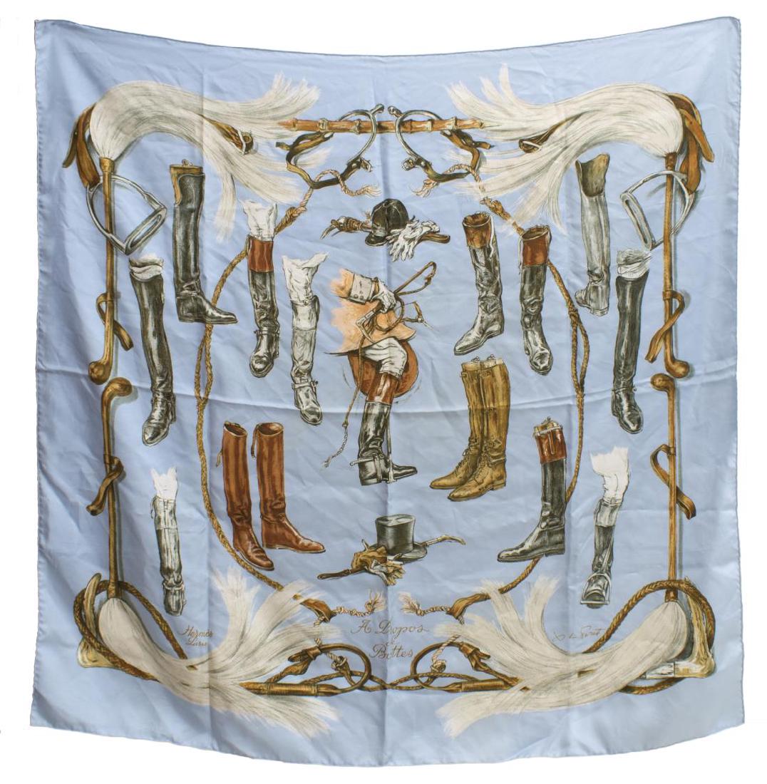 HERMES SILK TWILL SCARF 'A PROPOS DE BOTTES': Hermes silk twill scarf, "A Propos de Bottes," original design by Xavier De Poret c. 1962, retains care tag, some spotting, approx 36"h, 36"w, 0.25lbs *Provenance: Luxury goods are offered in partners