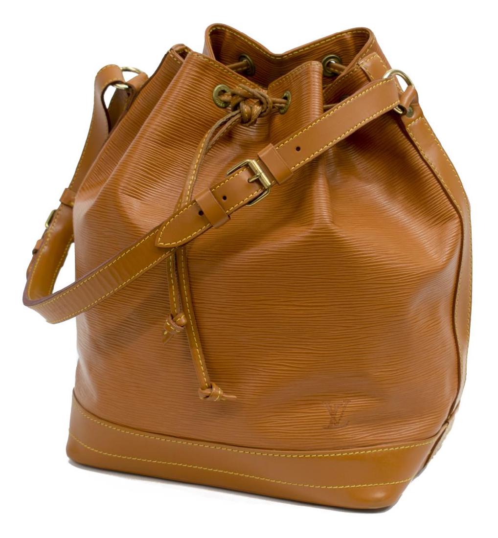 LOUIS VUITTON 'NOE' EPI LEATHER BUCKET BAG: Louis Vuitton "Noe" bag, in Cannelle Epi leather, with brass hardware, contrasting yellow stitching, single flat adjustable shoulder strap, olive green Alcantara lining, single zipper pocket at interi