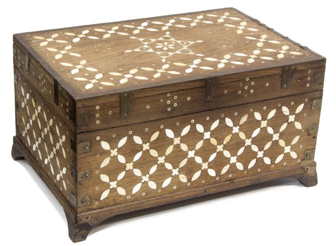 SAUDI ROSEWOOD DRESSING BOX WITH BONE INLAY: Rosewood dressing / marriage table box, Saudi Arabia, having dog-tooth pattern bone inlay throughout, star inlay to top of lid, brass edging, opens to small rectangular mirror under lid, three sliding