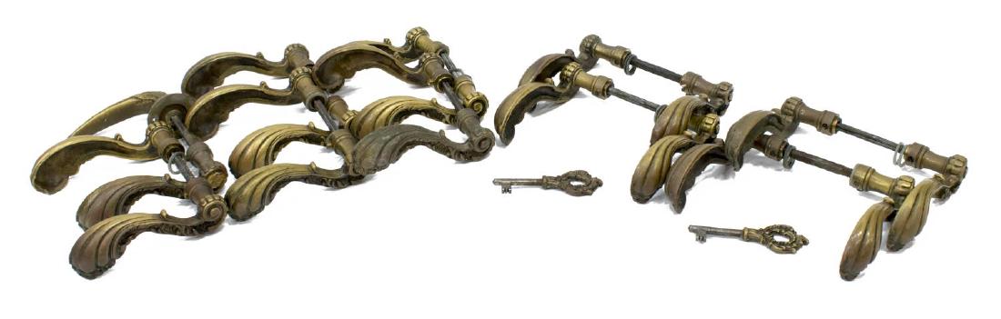 (10) ARCHITECTURAL GILT METAL DOOR HANDLES: (lot of 10) Architectural gilt metal door handles, including: (9) matched sets, approx 5"w, (1) odd set, approx 5"w; 11lbs total Start Price: $80.00