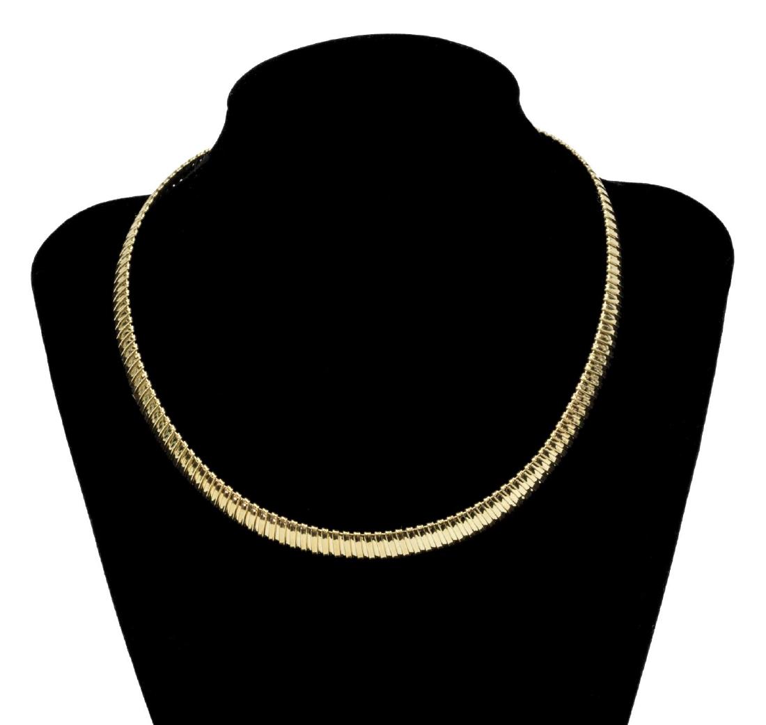 LADIES 14KT GOLD RIBBED CHOKER NECKLACE, 20.3GRMS: Italian 14kt gold ribbed choker, marked Italy, 14kt and B in a circle, approx 16"l, 20.3 grams Start Price: $375.00