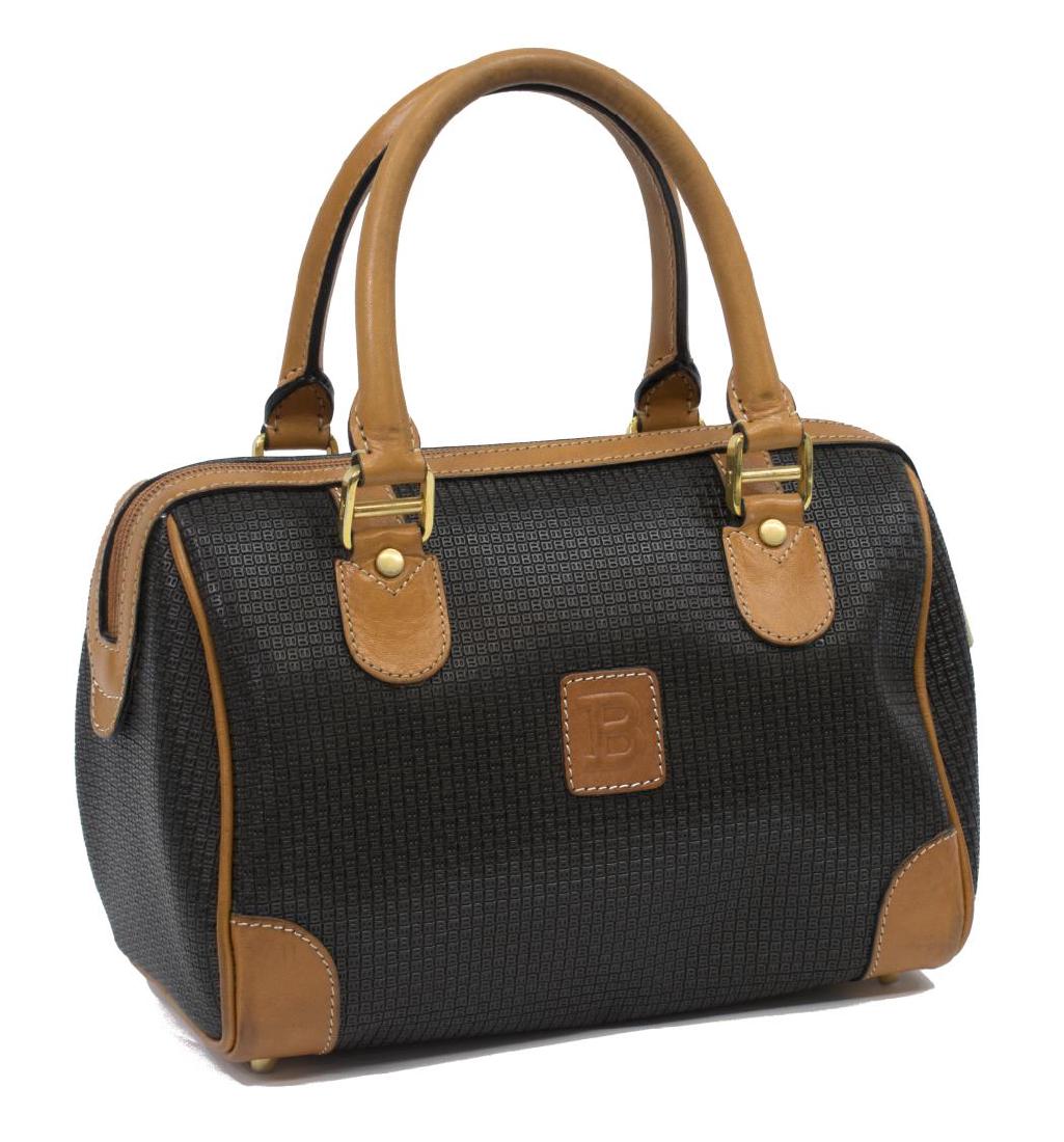 BALLY SMALL BOWLER BAG BROWN MONOGRAM CANVAS: Bally bowler bag in dark brown monogram coated canvas, with gold tone hardware, cognac brown leather trim and double rolled handles over zipper opening, light interior with single zipper pocket, retai