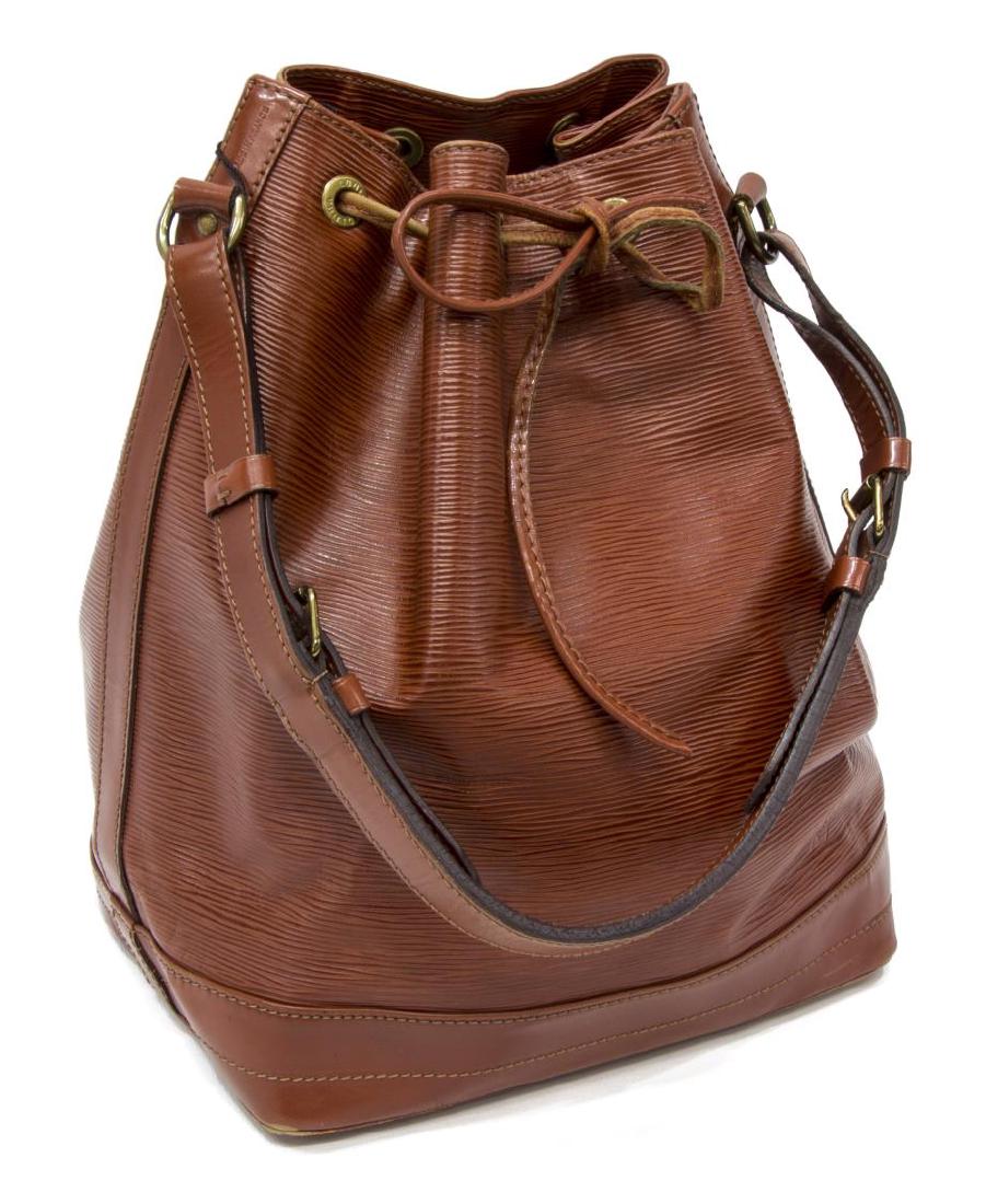 LOUIS VUITTON 'NOE' KENYAN FAWN EPI LEATHER BAG: Louis Vuitton "Noe," in Kenyan fawn Epi leather, with brass hardware, single flat adjustable shoulder strap, tonal Alcantara lining with single zip pocket at interior wall, drawstring closure at front