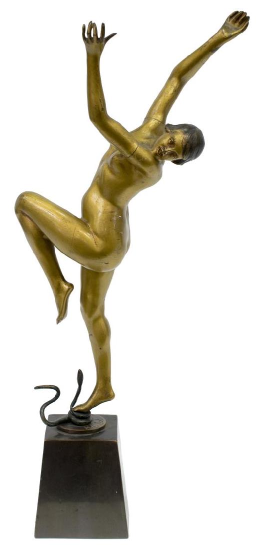 AFTER HENRY CALOT ART DECO GILT BRONZE NUDE: Art Deco bronze figure, Nude on Snake, signed H. Calot on base (Henry Calot), the gilt figure standing upon a snake, patinated base, visible seams at arms and legs, 21.5"h, 11.5lbs Start Price: $150.0
